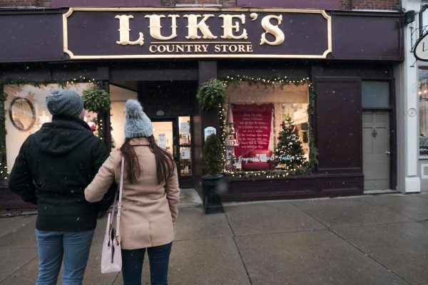 Couple standing in front of Luke's Country Store